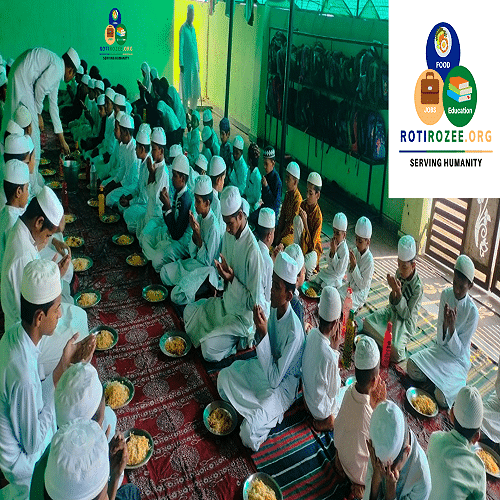 Children  praying before having the meal