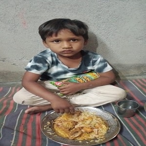 Little Boy having Rice