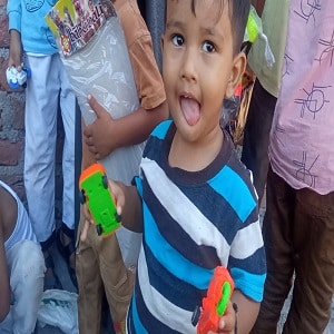 Little Boy holding toy